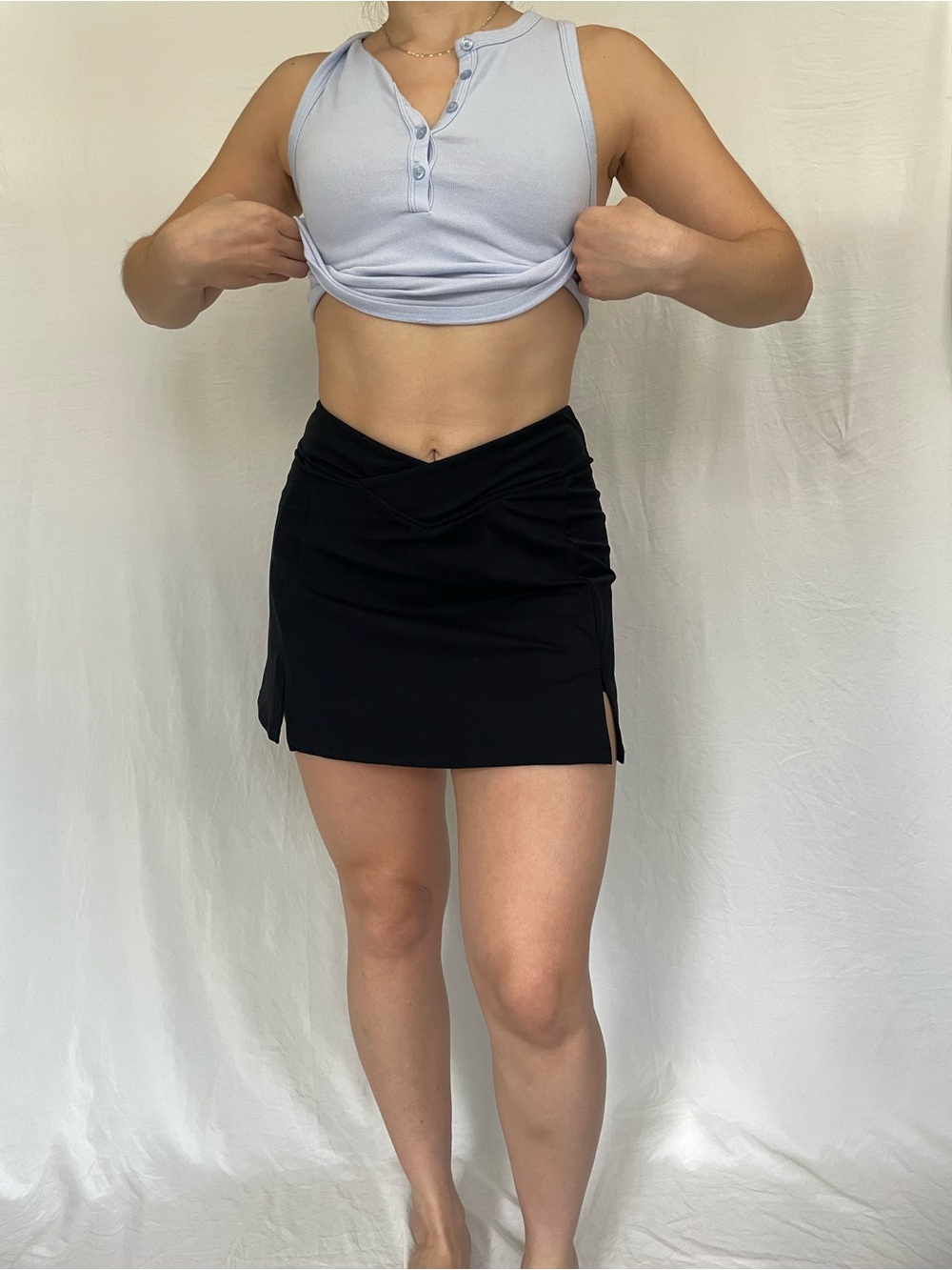 Black tennis mini skort with side slits